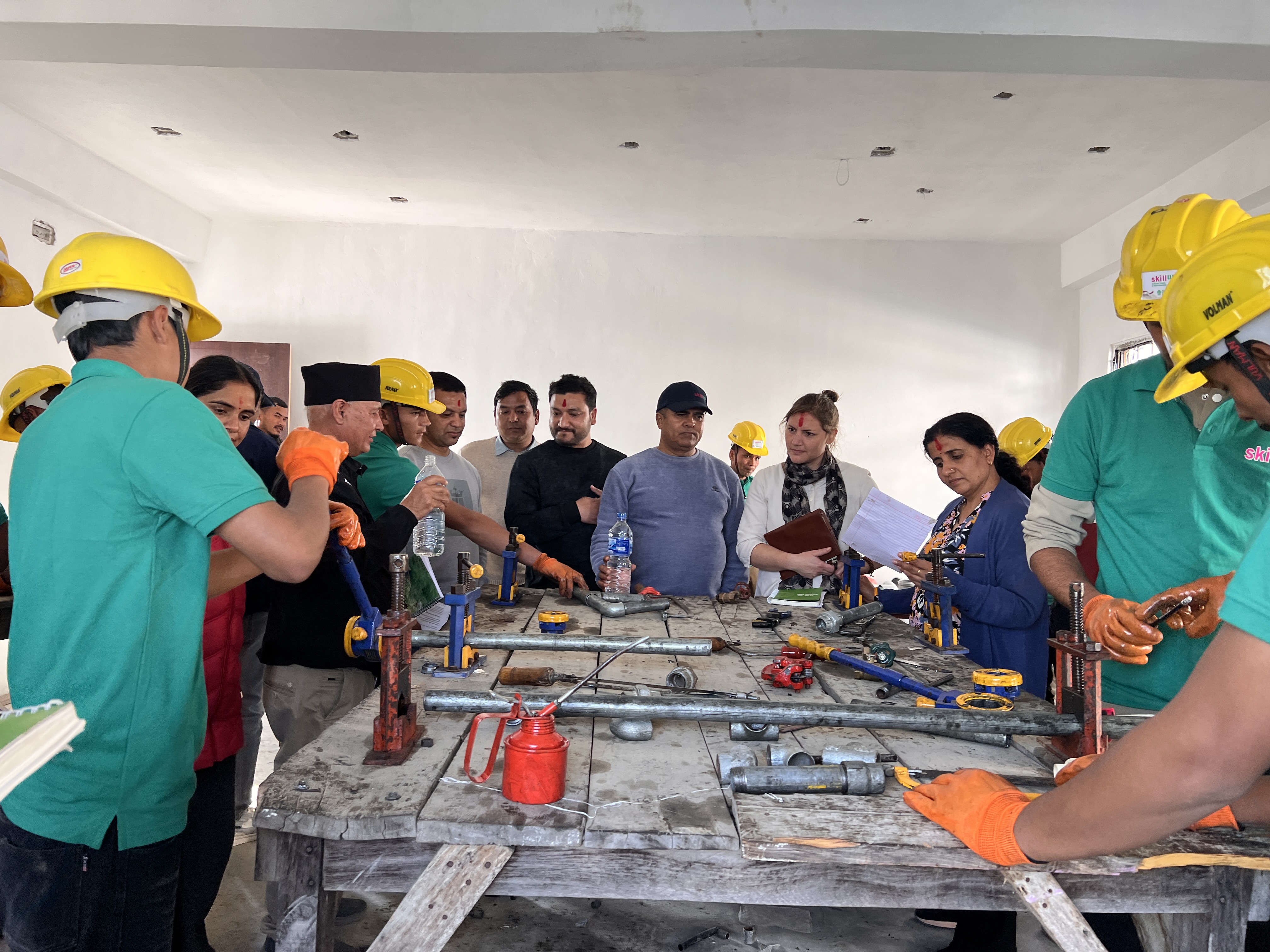 Skill up team from WHH and CEAPRED observing the ongoing plumbing training at Birendrangar 9, Surkhet Pic Archana